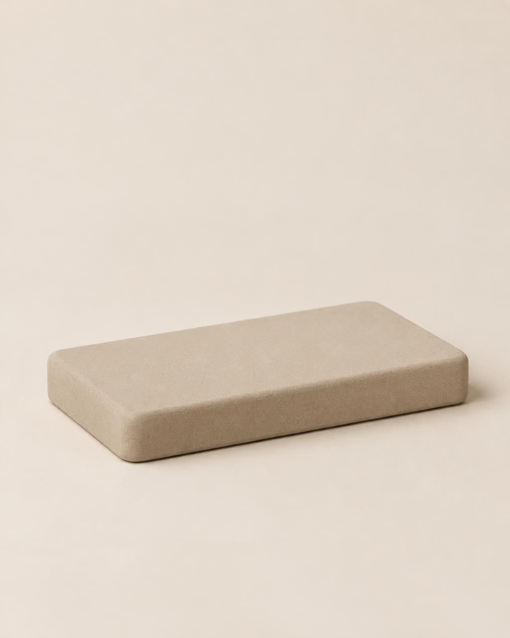 Quarter brick, a compact low-profile yoga prop